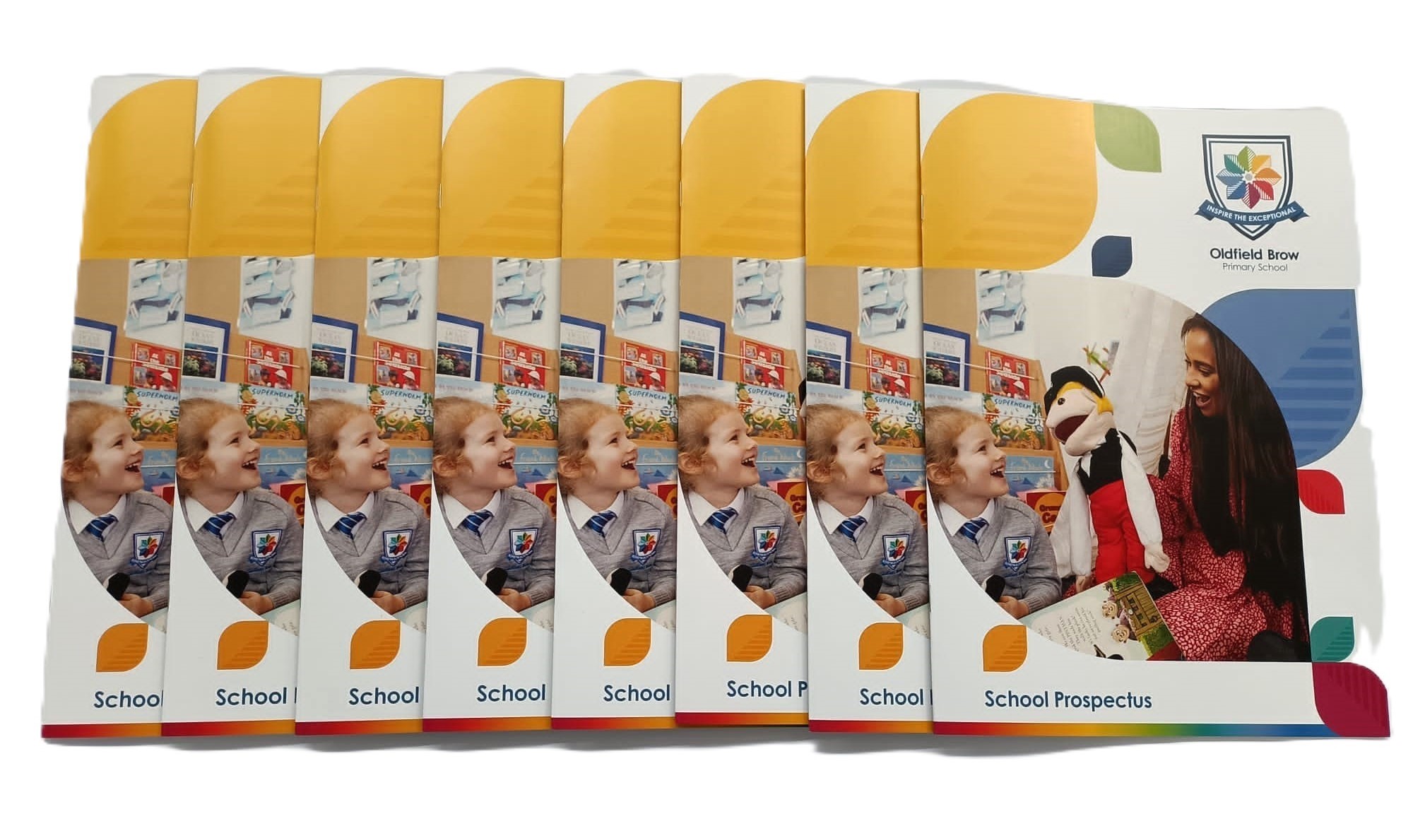 Quality printed brochures for a primary schools prospectuses, including an image of a teacher and child on the front and a colourful background.