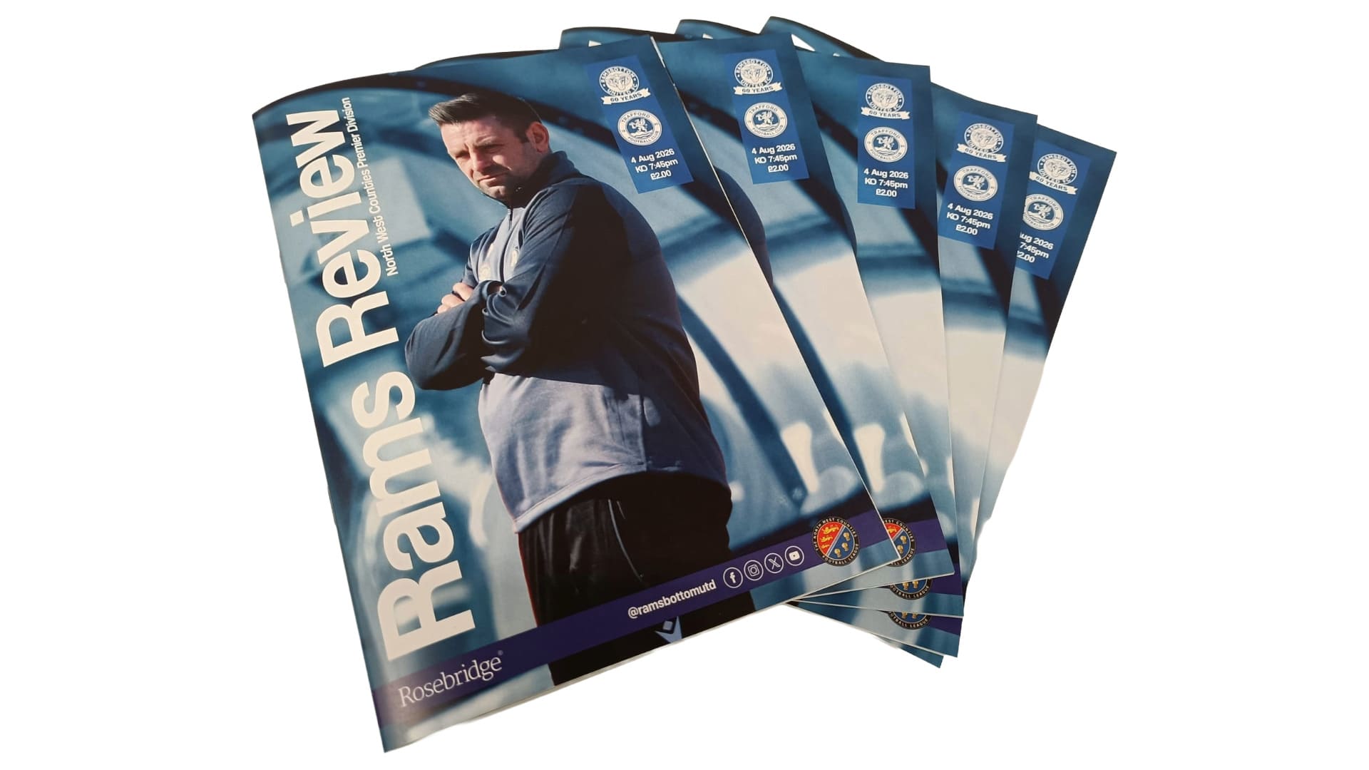 5 Ramsbottom United FC matchday programmes with a football coach on the front cover.